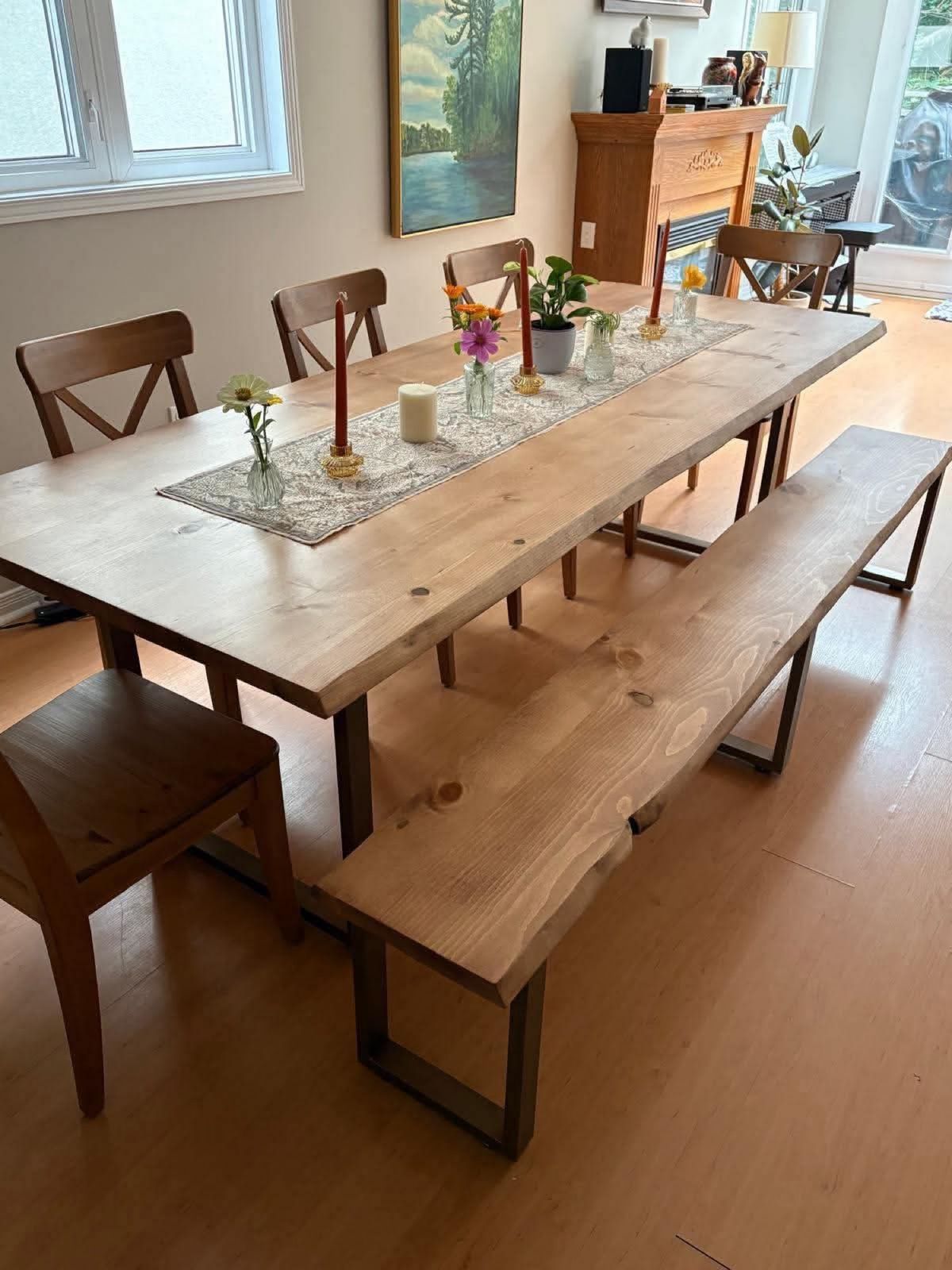 Light solid-wood dining table with a matching bench